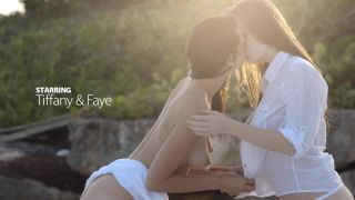 Faye and Tiffany shared a passionate kiss as they watched the sun set over the ocean