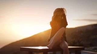 As the sun set over the Pacific Ocean, Francesca couldn't resist exploring every inch of her beautiful body while basking in the