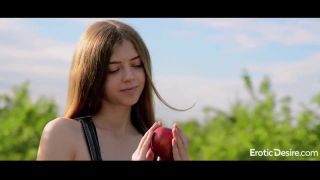 Kay J&#39;s apple garden was full of ripe and juicy apples, ready to be picked by her eager hands