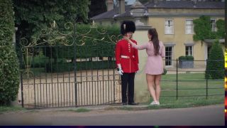 Sofia Lee couldn't resist the urge to stroke the guard's post as she watched him stand tall and proud