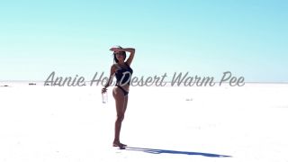 Annie&#39;s hot, desert-worn pussy drips with warm pee as she squats over the camera and strokes her cl