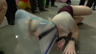 Blonde slave gets fisted in public by her master