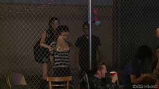 Bound brunette was publicly humiliated and fucked in the ass by a group of strangers while she was bound to a chair