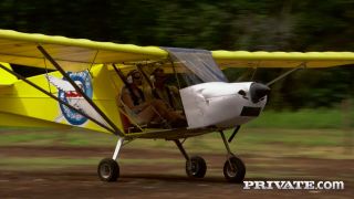 Katy&#39;s blonde hair shines bright as she soars through the sky on her flying lessons