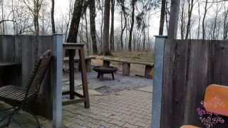 German teen bangend outside on picnic table